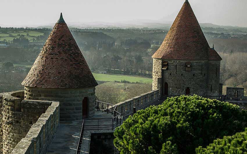 Castle Towers in Languedoc Roussillon, France, with The Little Voyager