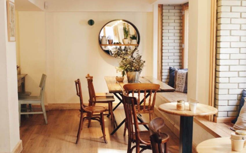 Petit a Petit Cafe Dining Area with The Little Voyager