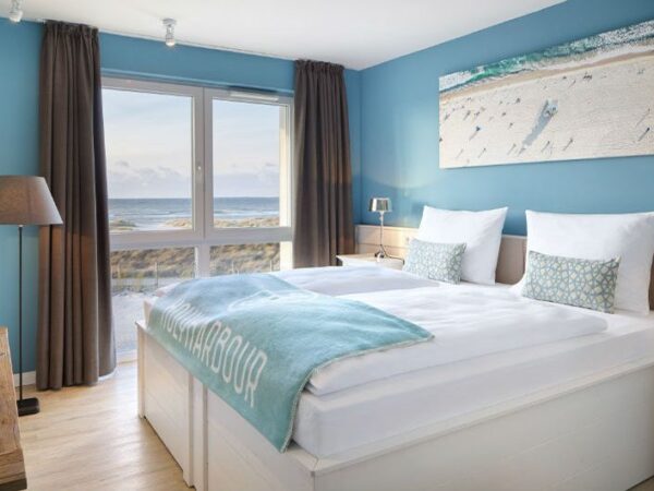 Beach Motel Heiligenhafen Sleeping Room with The Little Voyager