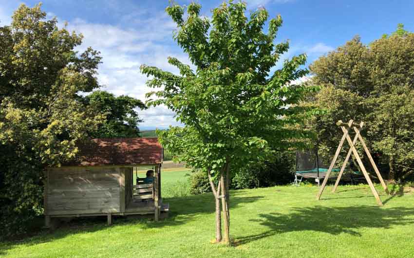 French Country Chic Garden Play Area with The Little Voyager