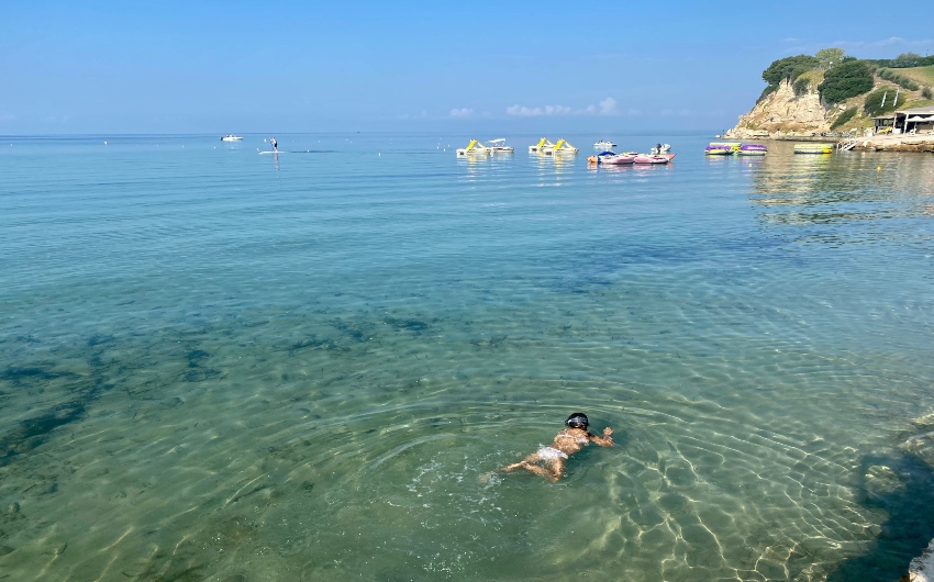 Girl snorkelling at Sani Beach
