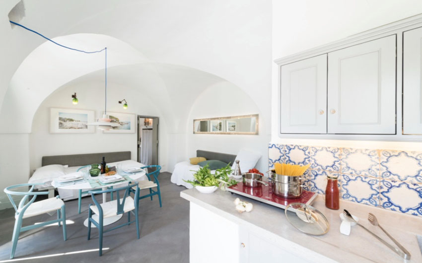 Apulian Design Apartments Living Area with The Little Voyager