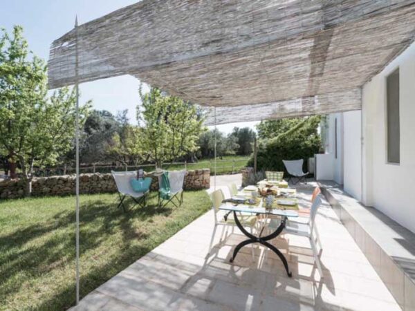 Apulian Design Apartments Outdoor Eating Area with The Little Voyager