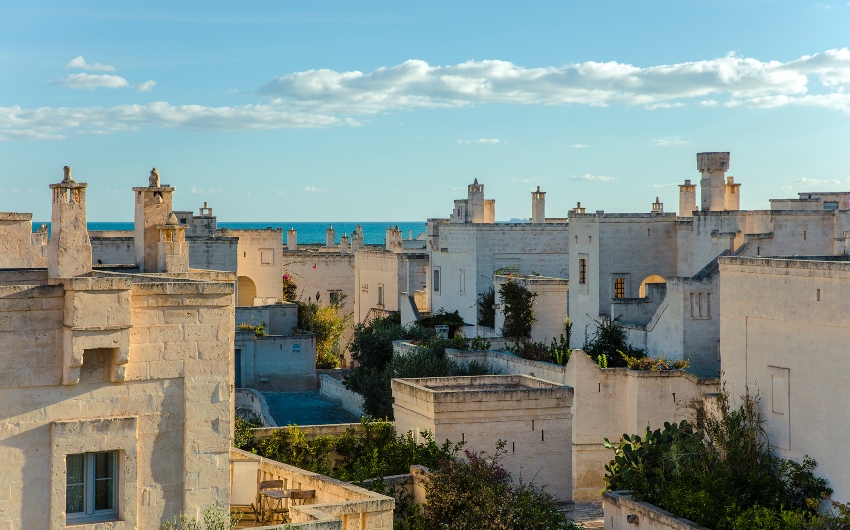 Exterior views of Borgo Egnazia with sea 