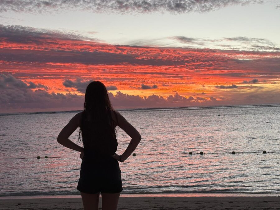 Girl watching the sunset at the St. Regis Le Morne Resort in Mauritius