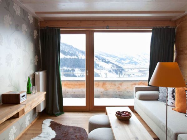 Haus Hirt Hotel Suite Living Room with The Little Voyager