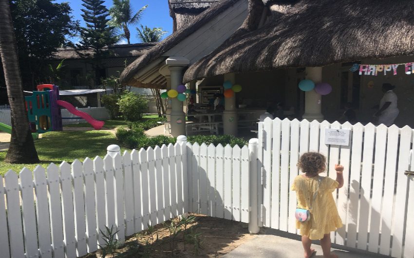 child opening gate