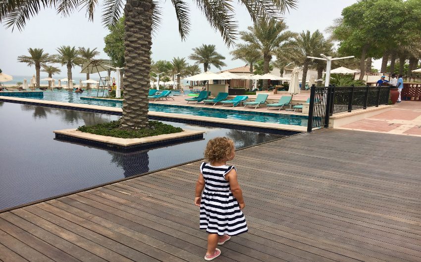 Girl walking in pool area