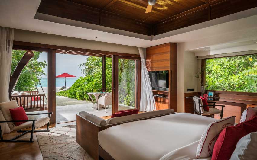 Niyama Private Islands Beach Villa Bedroom with The Little Voyager