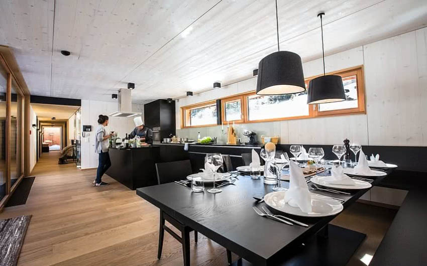 Austrian Mountain Resort Deluxe Chalet Dining Area with The Little Voyager