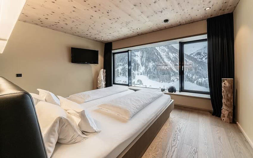Austrian Mountain Resort Tower Suite Bedroom with The Little Voyager