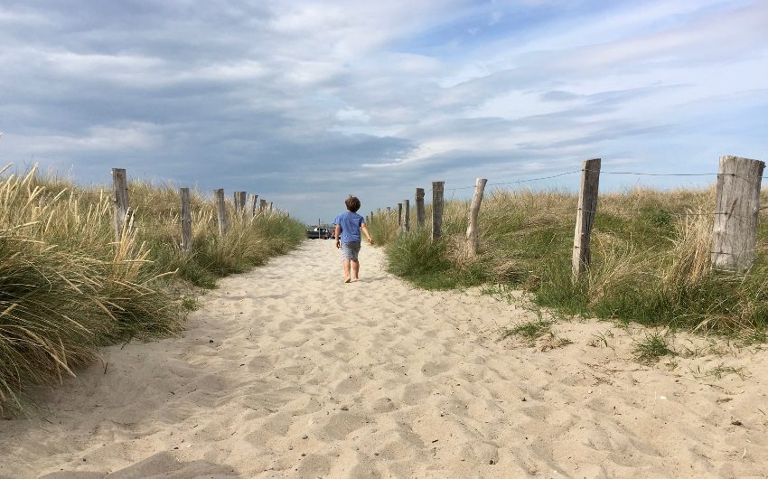 The Baltic Sea Escape boy running towards beach