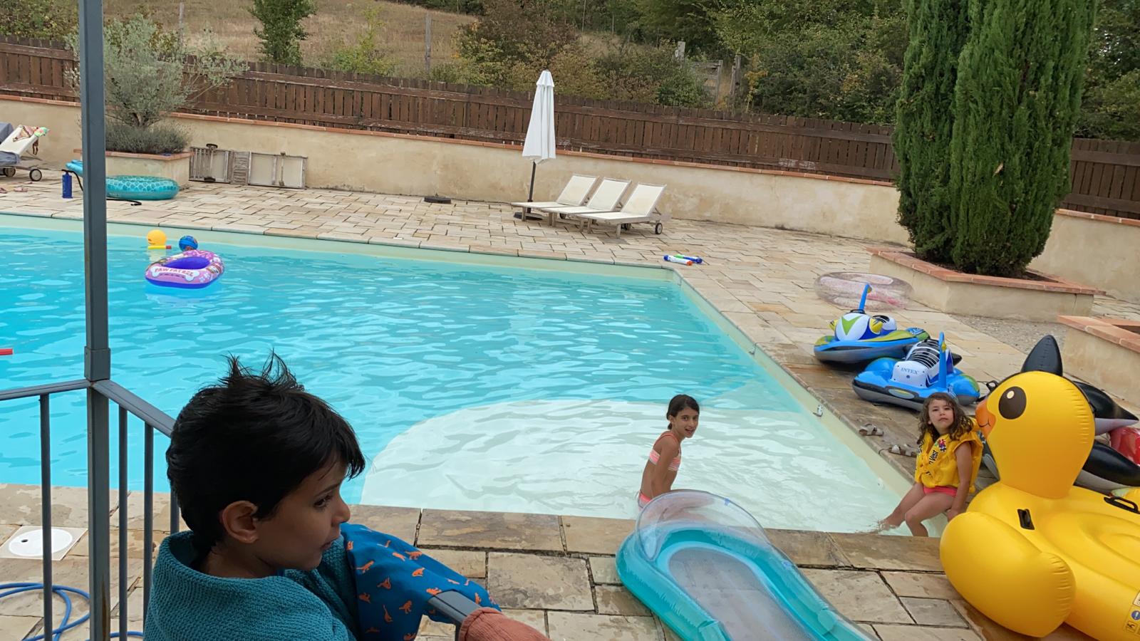 Kids playing in the pool at the French Hamlet