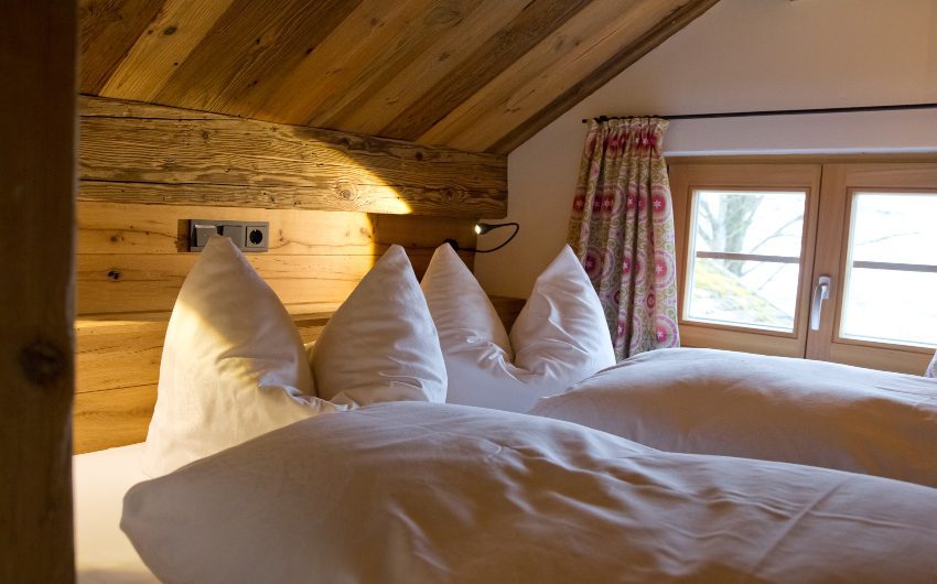 Bedroo inside the Alpine Cottage at the Bavarian Farm