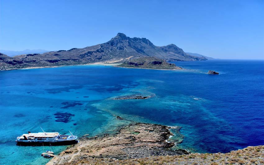 View of Crete's Batos Beach with The Little Voyager