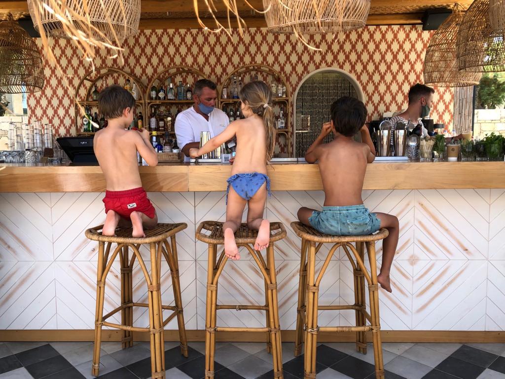 Children sitting at the bar at the Cretan Eco Resort 