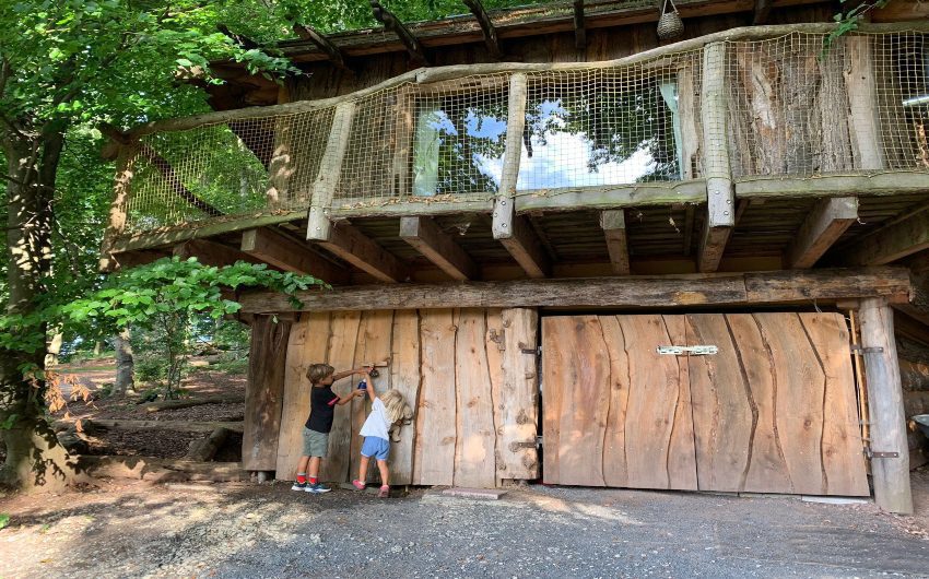 Children getting water at the German Treehouses