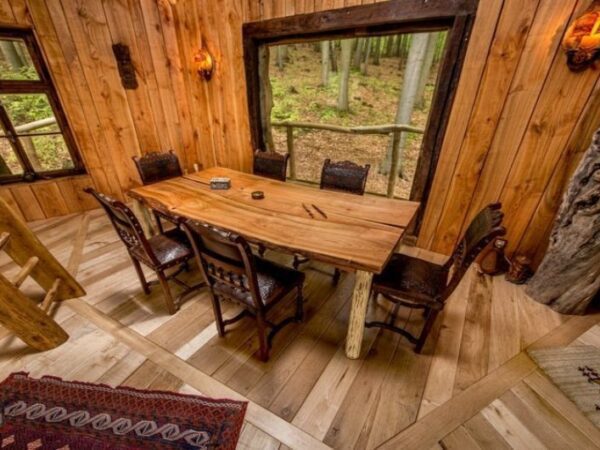 Seating area inside a treehouse at the German Treehouses