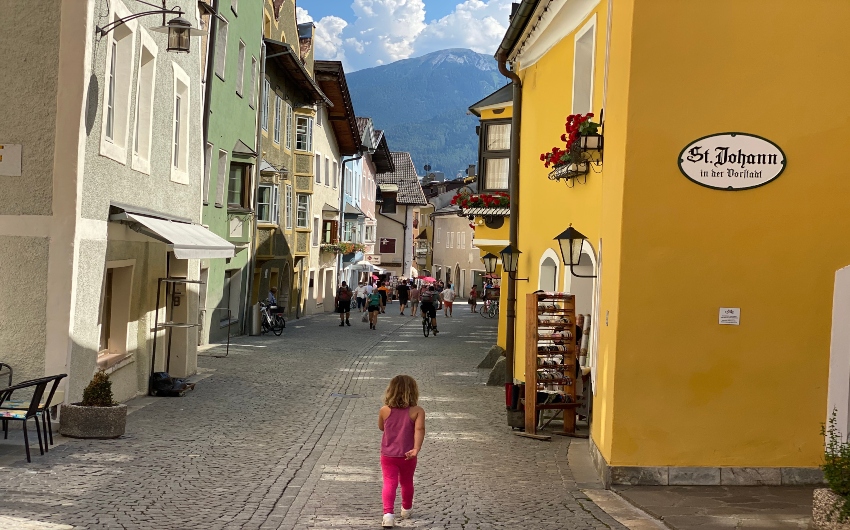 Girl walking through the town of Sterzing