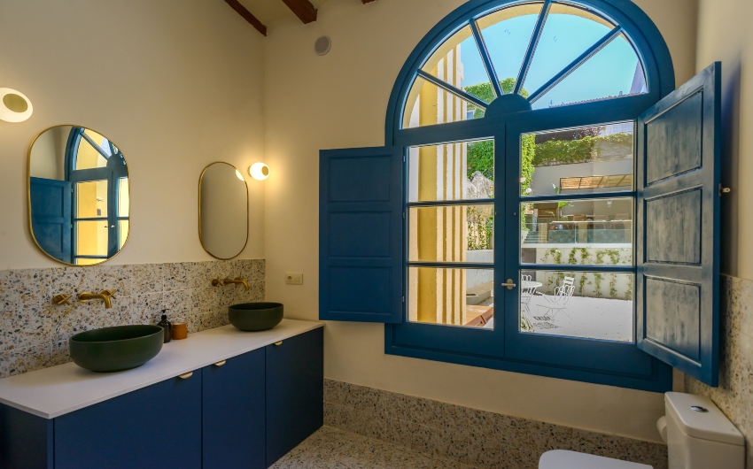 Costa Brava Pool House bathroom with windows