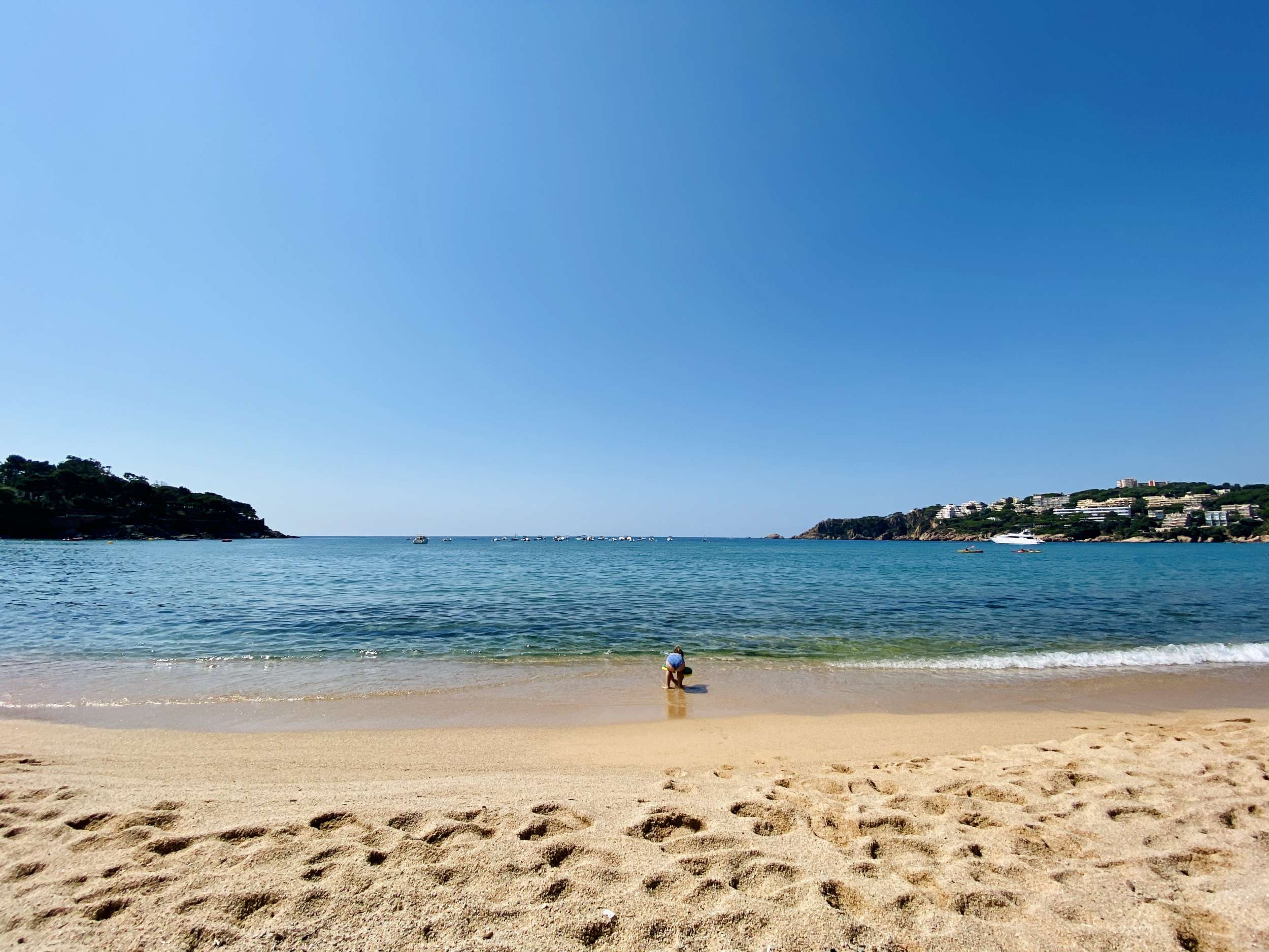 girl on beach at the Costa Brava