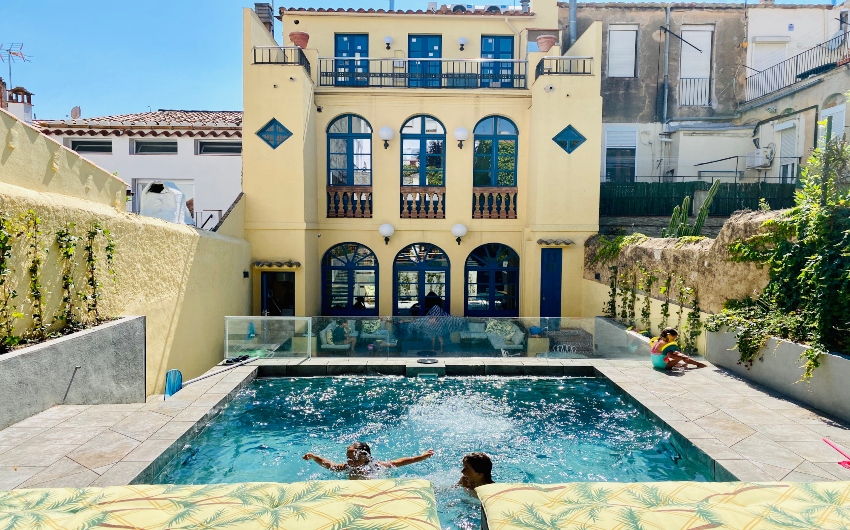 Kids playing inside pool at Costa Brava Pool House