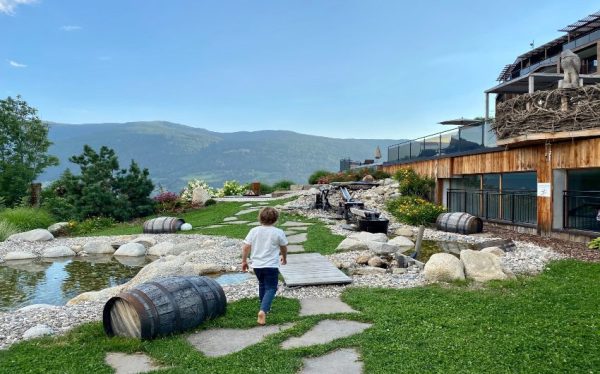 Boy walking on the grounds of the South Tyrolean Panorama Retreat