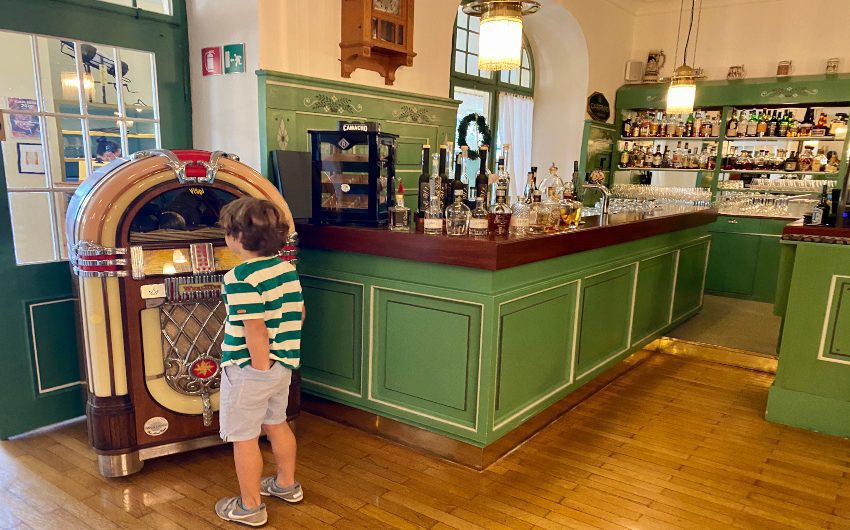 Boy at bar at the South Tyrolean Art Nouveau Hotel