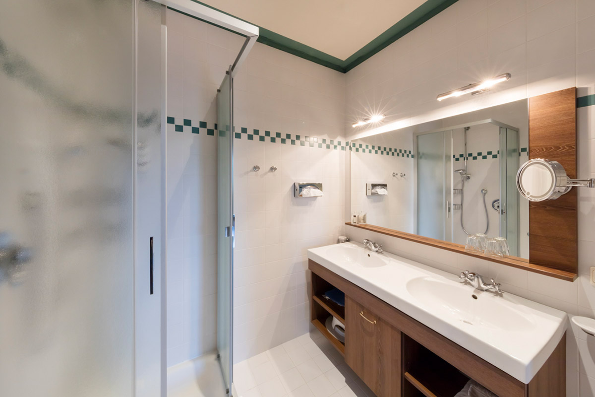 bathroom inside a Suite at the South Tyrolean Art Nouveau Hotel