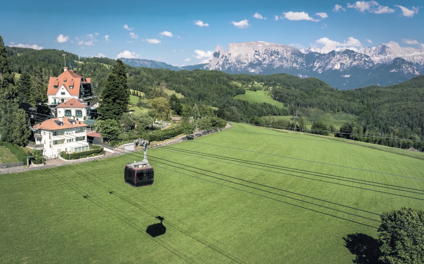 Panorama view and cable car at the South Tyrolean Art Nouveau Hotel