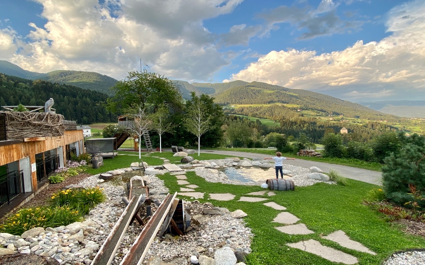 Boy walking on the grounds of the South Tyrolean Panorama Retreat