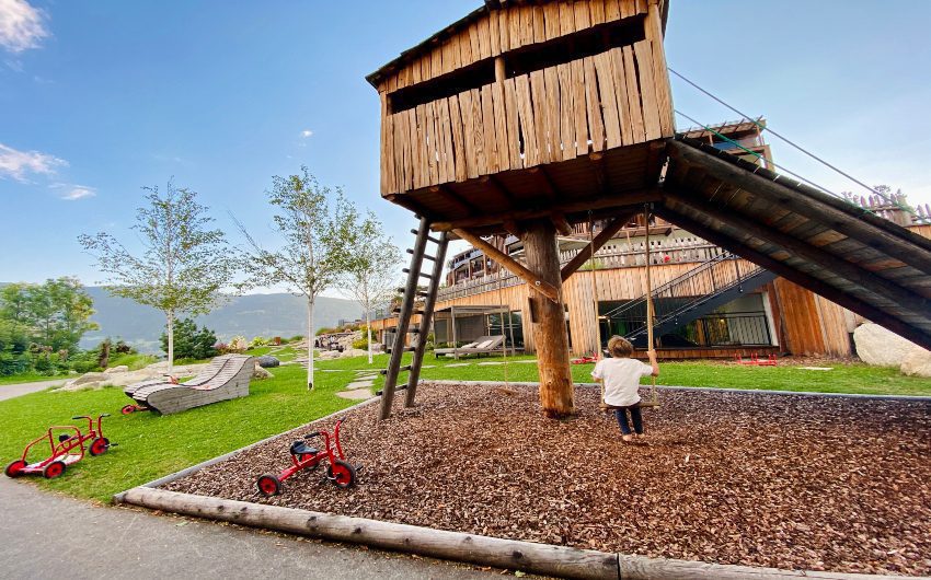 Boy on a swing at the South Tyrolean Panorama Retreat