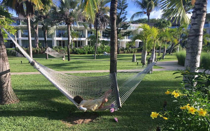 Girl on hammock at LUX* Grand Gaube