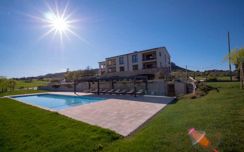 The Catalan Country Apartments exterior view with pool