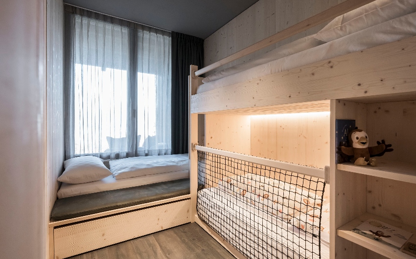 Childrens bedroom at AKI Family Resort PLOSE