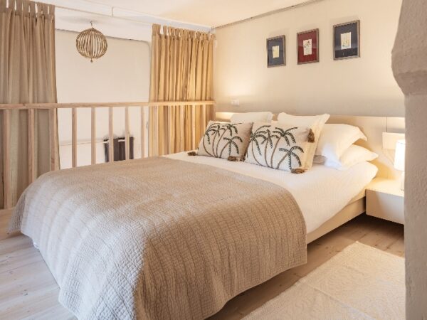 A double bedroom on a mezzanine