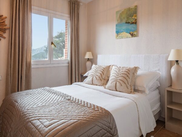 a double bed in a room of a Costa Blanca Retreat